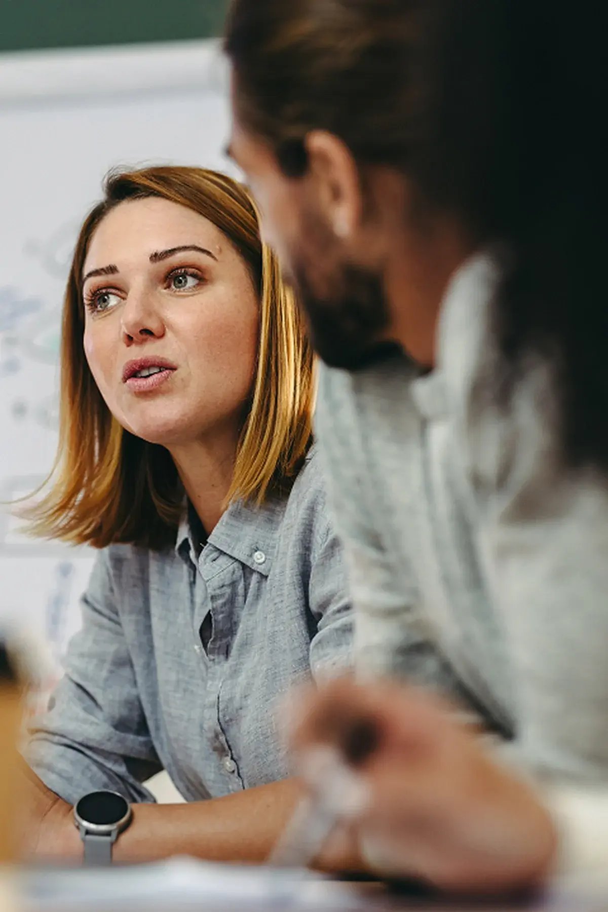 woman-talking-in-meeting_2x3